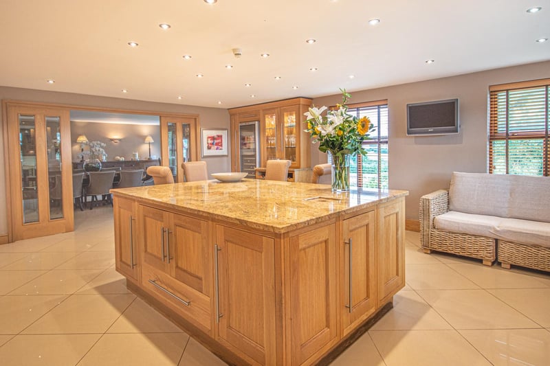A feature island within the living space of the dining kitchen