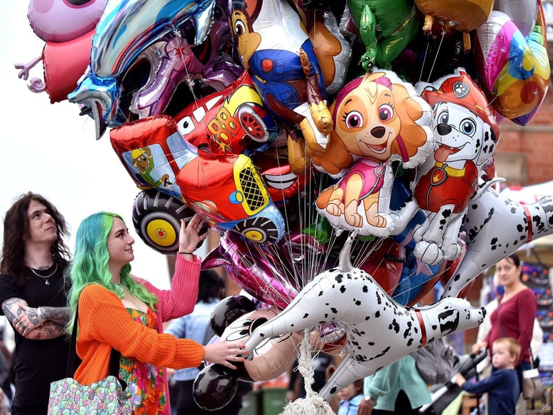 Choosing a balloon on Regatta Monday.
214001g