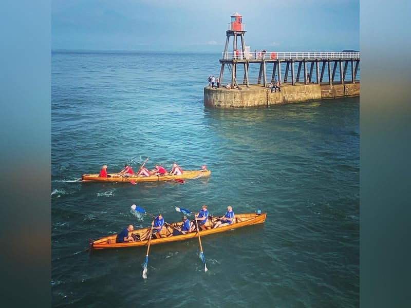 Fishermen's and Friendship are neck and neck in the rowing.
Picture: Helen Hunter.