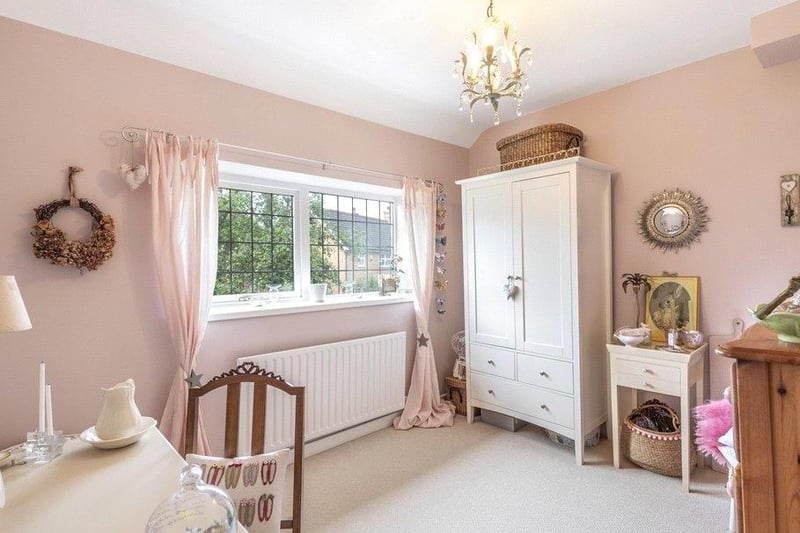 The second bedroom could also fit a double bed, but is used by the current owners as a dressing area.