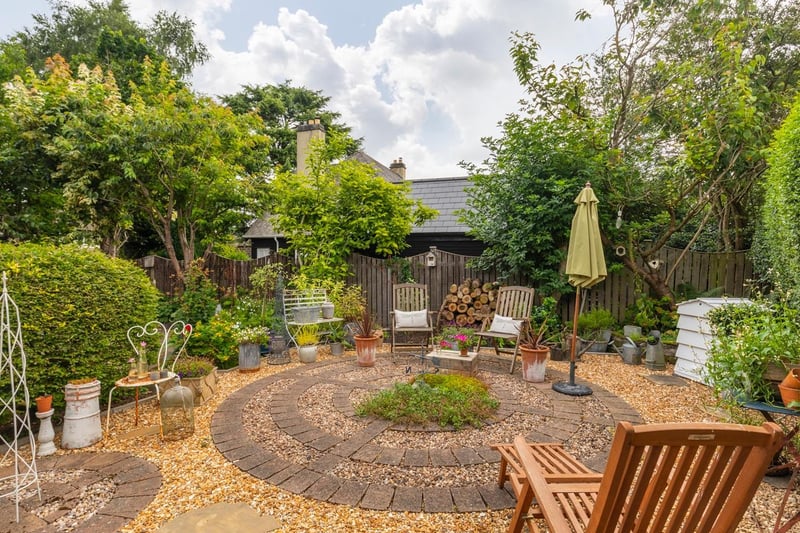 Outside is a wonderful and private south facing garden with lawn area and a delightful patio area.