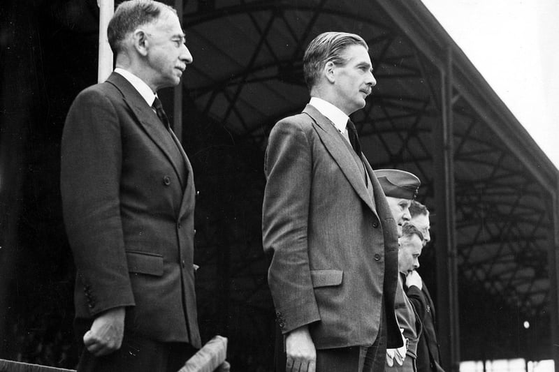 Anthony Eden (centre) observes a series of military parades.
