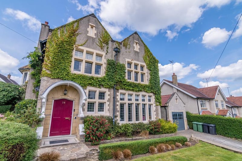 Originally constructed in 1901, the property has many original features including the striking double front door, painted a beautiful deep berry,  set beneath an original canopy.
