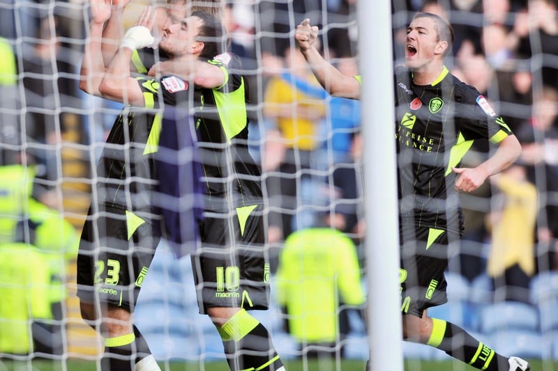 Robert Snodgrass blows kisses to the Leeds fans after equalising. Luciano Becchio and Paul Connolly join in the celebrations.