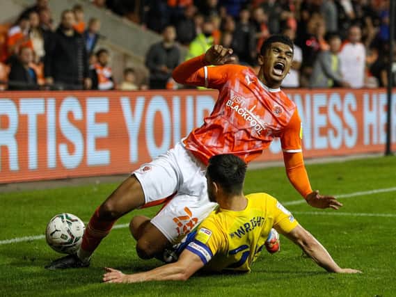 A painful night  for Blackpool as Tyreece John-Jules goes down under the challenge of Bailey Wright
