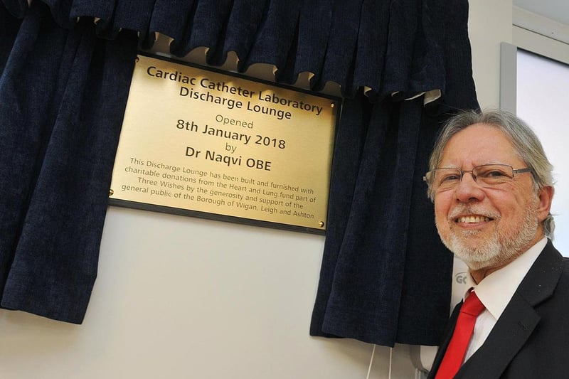 Dr Naqvi OBE unveils the plaque to officially open the Cardiac Catheter Laboratory Discharge Lounge at Wigan hospital in January 2018.