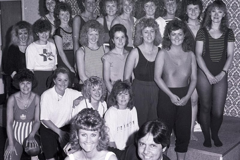 Dr Naqvi receives a boost to his funds from the ladies aerobics class at Pemberton Conservative Club  Wigan in 1989