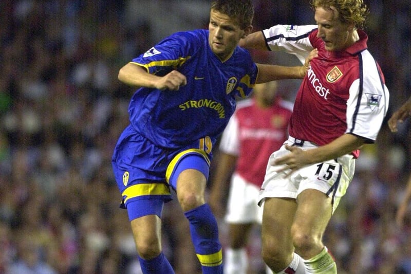 Eirik Bakke holds off Arsenal's Ray Parlour.