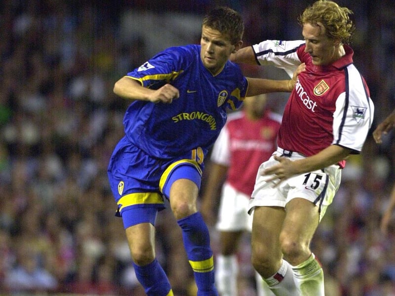 Eirik Bakke holds off Arsenal's Ray Parlour.