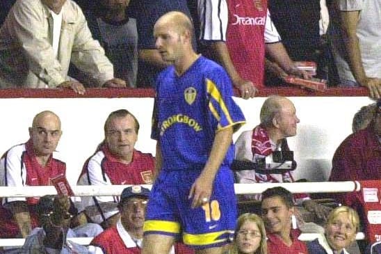 Danny Mills heads for an early bath after being sent off by referee Jeff Winter.