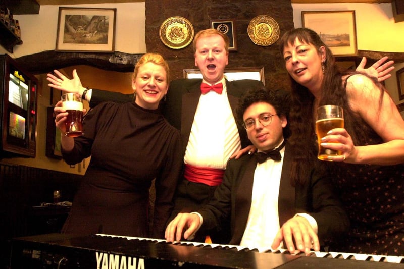 Regulars at The Junction pub in Otley were entertained with an Opera evening. Pictured are performers Richard Stark and Andrew Hubbard with Peggy Krengel (cook) and Jude Caldwell (landlady).
