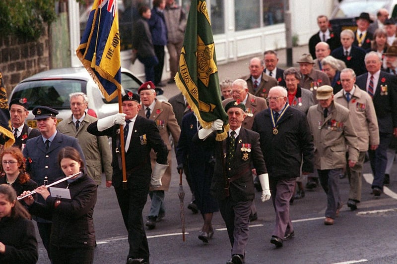 War veterans and young people proudly take part in the Otley Remembrance Day Parade through the town in November 2001.