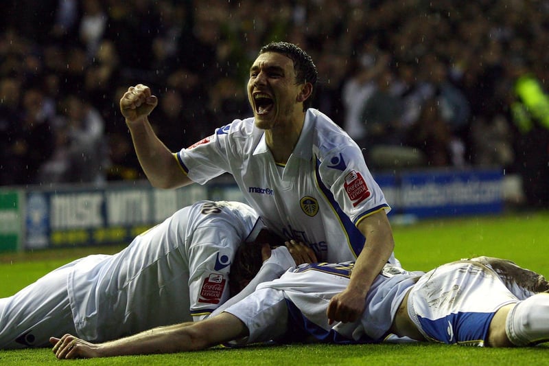 Robert Snodgrass celebrates with goalscorer Luciano Becchio during the League One play-off semi-final second leg clash against Millwall at Elland Road in May 2009.