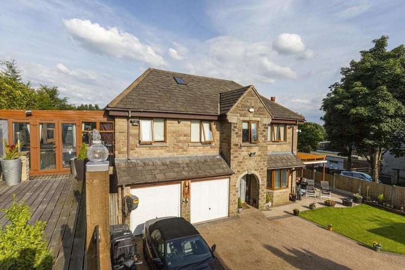 This four bedroom detached house sits within a sought-after residential location, set within low landscaped gardens with an electric gated generous driveway. For sale with Charnock Bates - 01422 757046