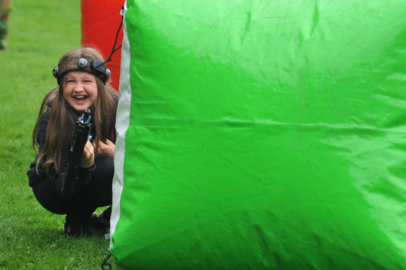 Katy Hitchen, 11, tries out the outdoor laser quest game.
