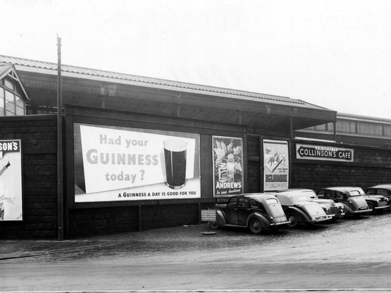 Cars parked along Central Station wall in December 1952. On the wall are advertising hoardings for Guinness, Andrews Liver Salts and Iglodine Antiseptic, also a sign pointing to Collinson's Cafe.