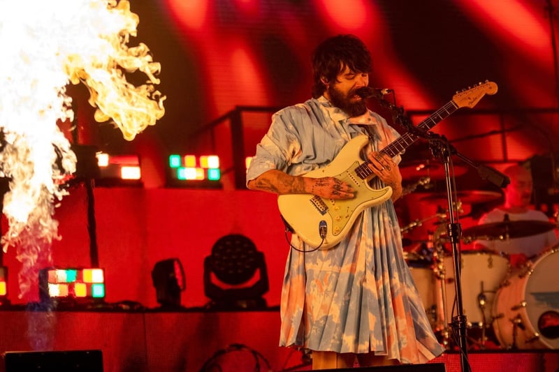 Biffy Clyro, who replaced Queens Of The Stone Age as headliners, on stage
