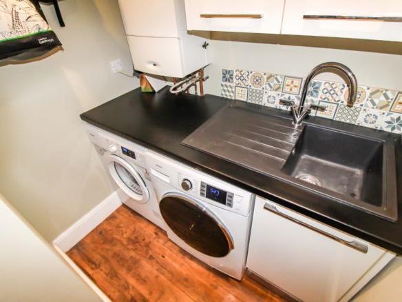 There is also a handy utility room.