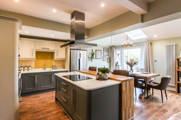 The kitchen is the breathtaking main feature of this house. The kitchen living space is impeccably designed throughout and split into four sections: kitchen, dining, play and living area.