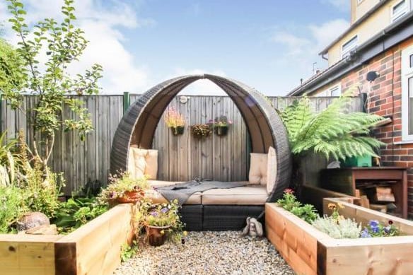 There is a lovely garden outside with additions such as this little nook, which could be used for relaxing and reading.