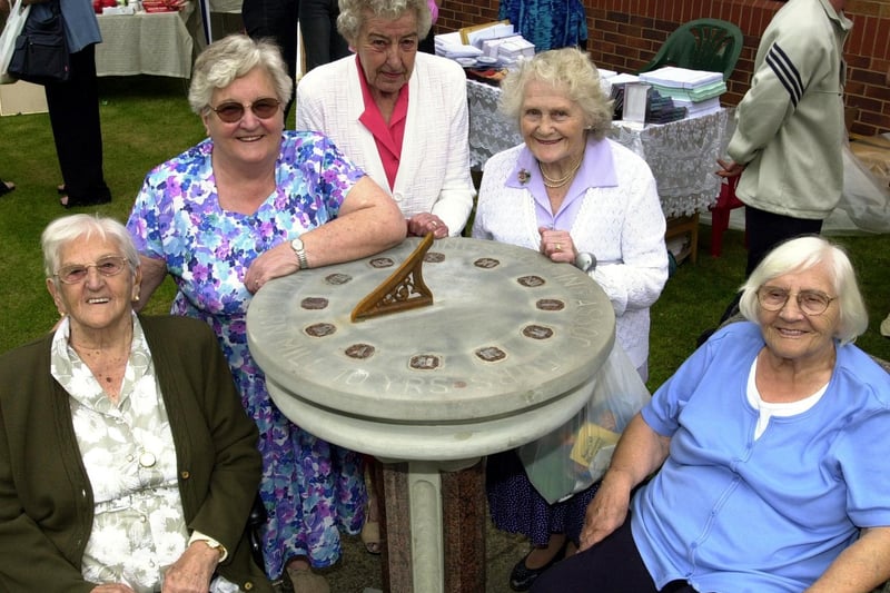 Ladies at the sun dial to mark the 10th anniversary of the Hawthorn Mill housing complex in Lower Wortley. Pictured, from left, are Lillian Wilson, Gwyneth Lawton, Doris Swan, Kathleen Downes and Majorie Messenger.