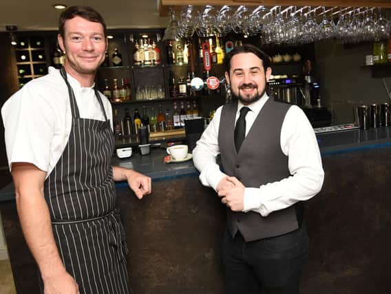 New owner chef Chris Crowell, left, with assistant manager Brandon Monk, right.