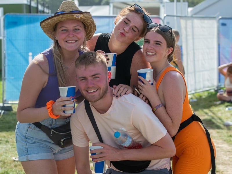 A group show off their festival fashion