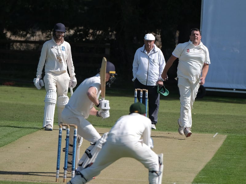 Andy Smith in bowling action

Photo by Richard Ponter
