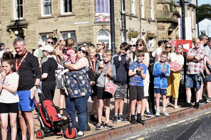 Spectators lined the streets to cheer on the runners