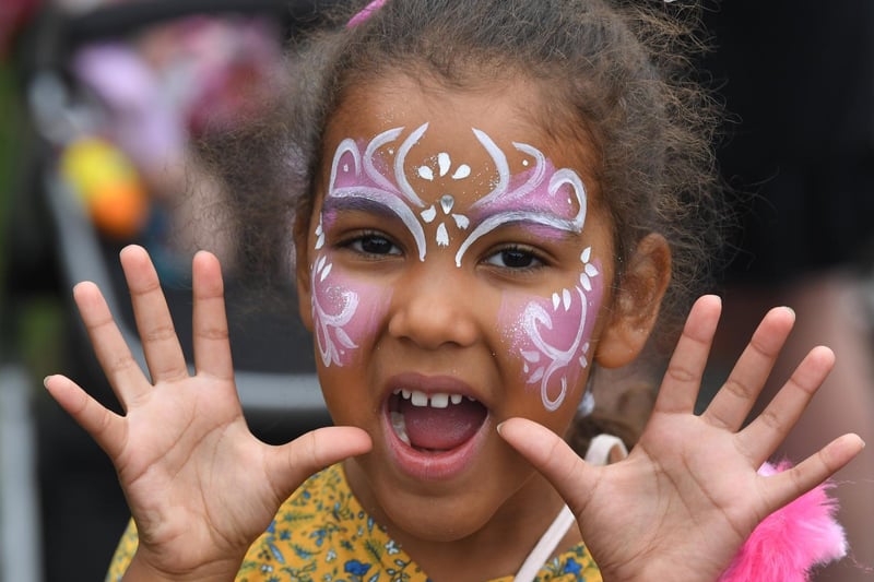 Dorothea Schooler, four, was among the youngsters who made the most of the opportunity to have her face painted at the Festival
