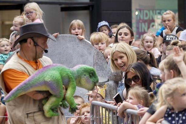 Children were able to touch and say hello to the dinosaurs.