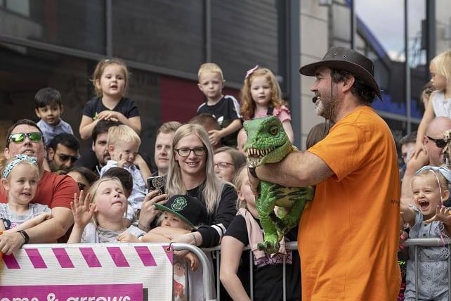 The event, in a collaboration with Wakefield BID, included a triceratops, baby dinosaurs and dramatic stilt walkers.