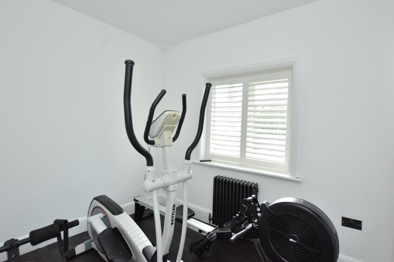 Another one of the other bedrooms is being used as a home gym, but could be reverted back to a bedroom or a home office space.
