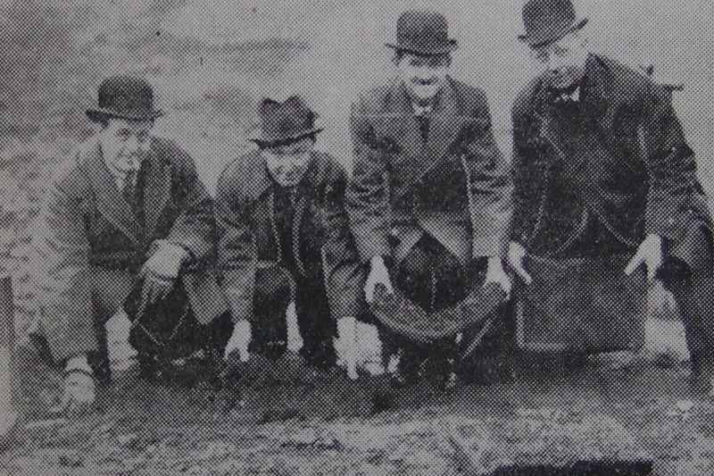 The first grass sods are laid by chairman Dr Howie Muir, secretary-manager Joe McClelland, and directors Edgar Denison and Joe Firth, December 1920.