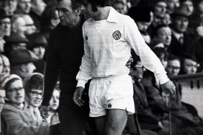 An injured Mick Bates heads back to the changing rooms at Elland Road.