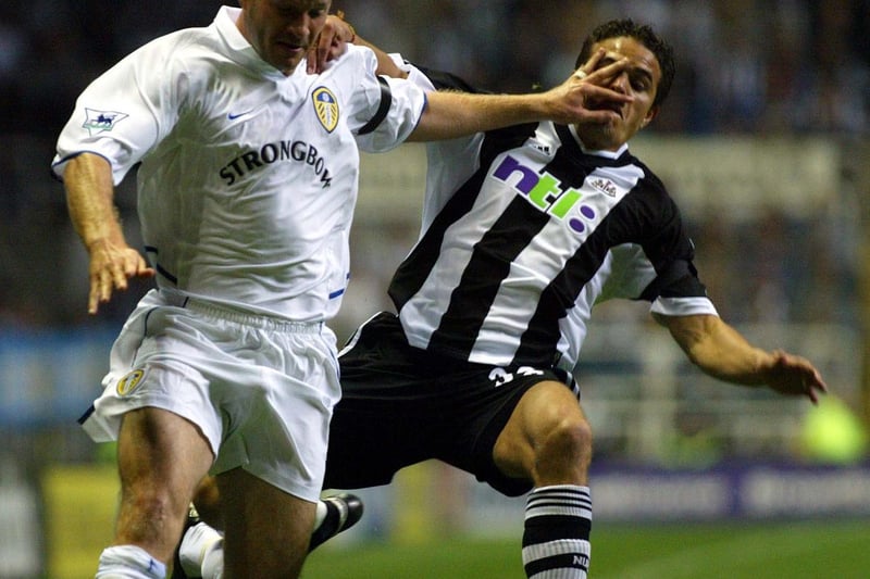 A hand in the face for Newcastle United's Laurent Robert from a marauding Danny Mills.