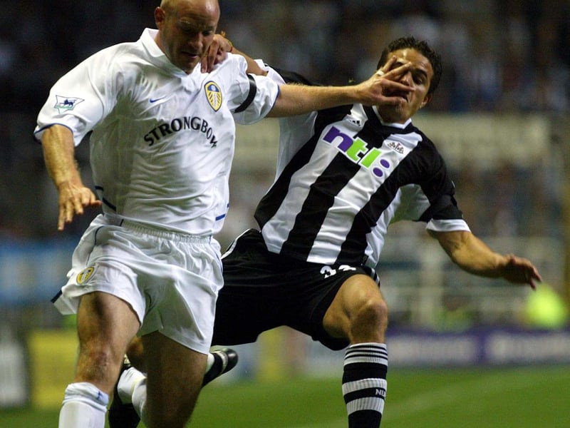A hand in the face for Newcastle United's Laurent Robert from a marauding Danny Mills.