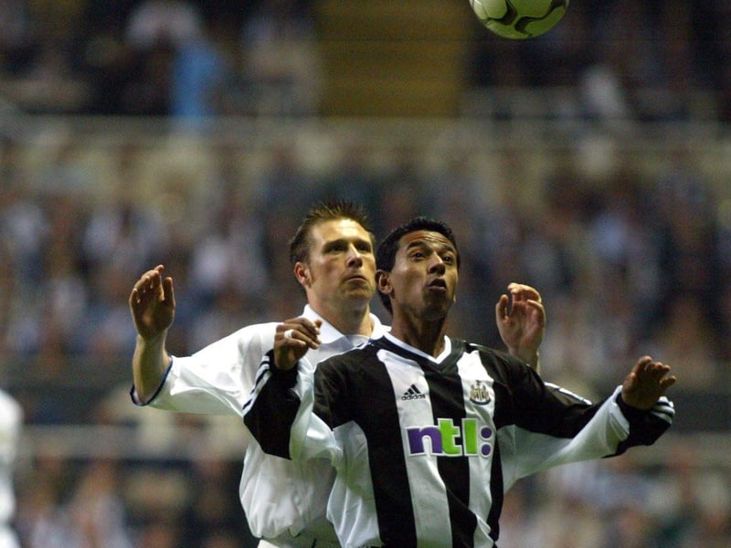 All eyes on the ball for Nick Barmby and Newcasle United's Nobby Solano.