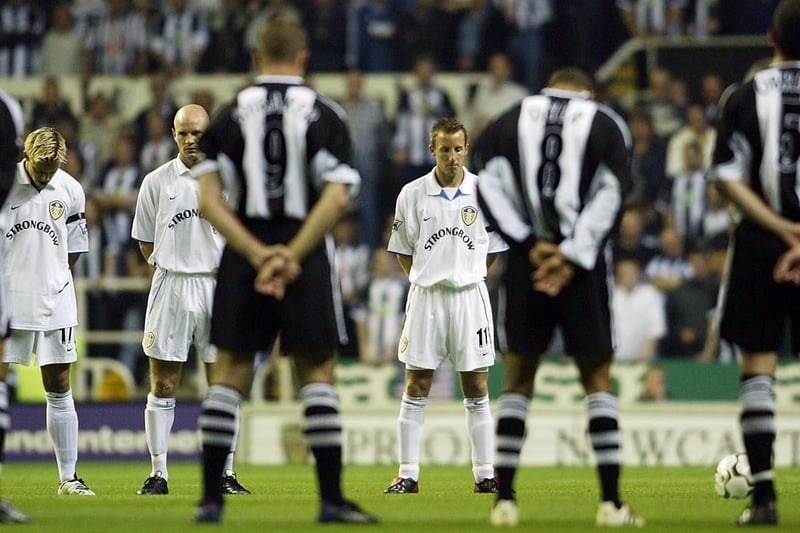 Lee Bowyer (centre) leads the minutes silence in rememberence of those who lost their lives in the September 11 terrorist attacks.
