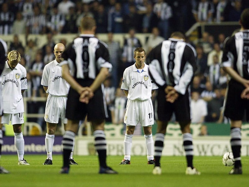Lee Bowyer (centre) leads the minutes silence in rememberence of those who lost their lives in the September 11 terrorist attacks.