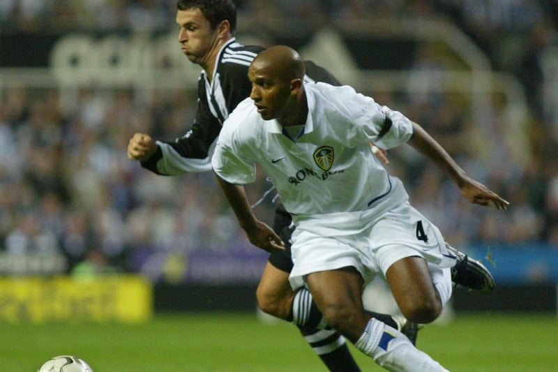 Olivier Dacourt and Newcastle United's Gary Speed chase down the ball.