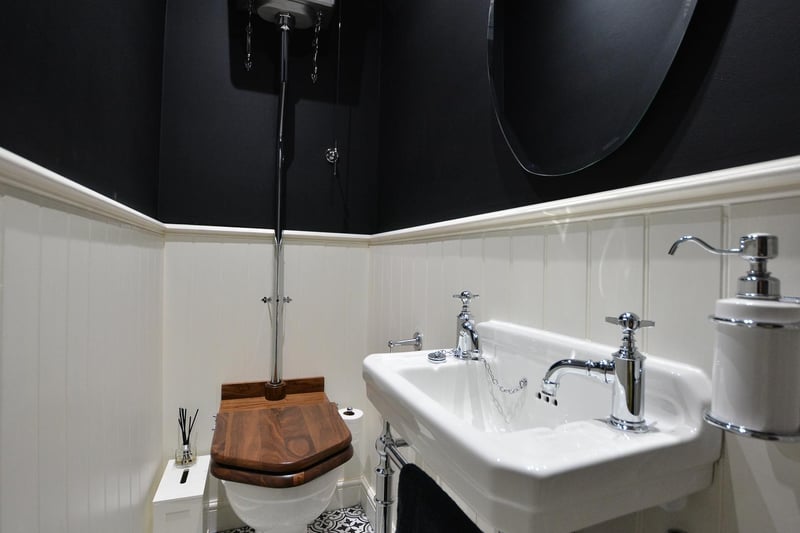 From here is also a handy guest WC with Victorian patterned tiled flooring, high flush Burlington WC and wash hand basin.