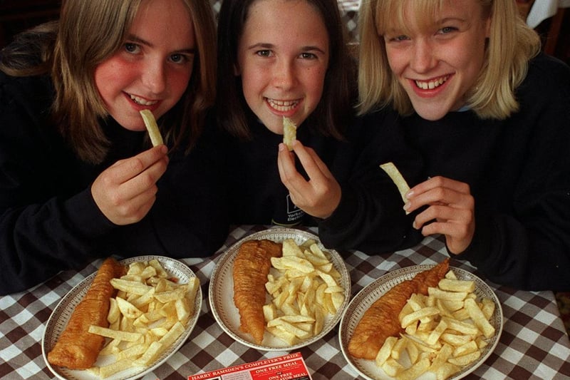 Free fish and chips were enjoyed  at Harry Ramsden's by children who took part in West Yorkshire Police's 'Leeds Lifestyle' scheme. Pictured are Sally Germain, Laura Hutchinson and Frances Heap.