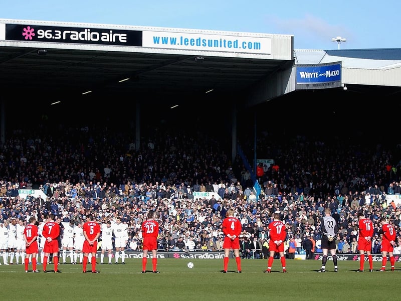 Leeds and Liverpool players pay their respects to former Leeds player John Charles with a minute of silence ahead of kick-off.
