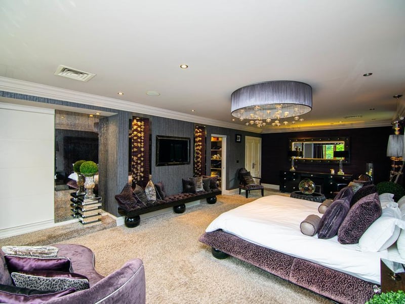 On the first floor is the magnificent master bedroom, a large room with features such as the bespoke bed with halo lighting.