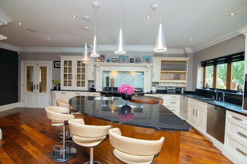 The impeccably designed open plan living area is the hub of the home. The kitchen was designed and installed by Jeremy Wood Interiors of Wetherby and is appointed with the finest range of Miele appliances throughout and a large wine refrigerator.