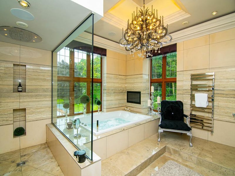 The master bathroom is also amazing, and would not be out of place in an upmarket hotel. The jaw dropping room is fully tiled with finished from Lapicida in Harrogate and features a hot tub, built in television and large rainfall shower.