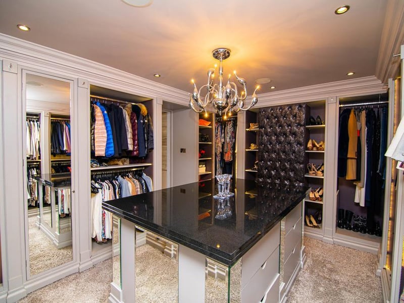 The master bedroom benefits from a walk-in dressing area.