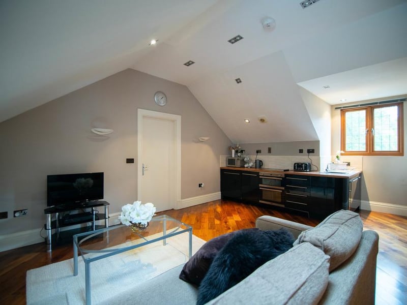 Situated above the detached garage block is a further annex apartment.There is a generous living area with kitchen and dining space and a bedroom with bathroom facilities.