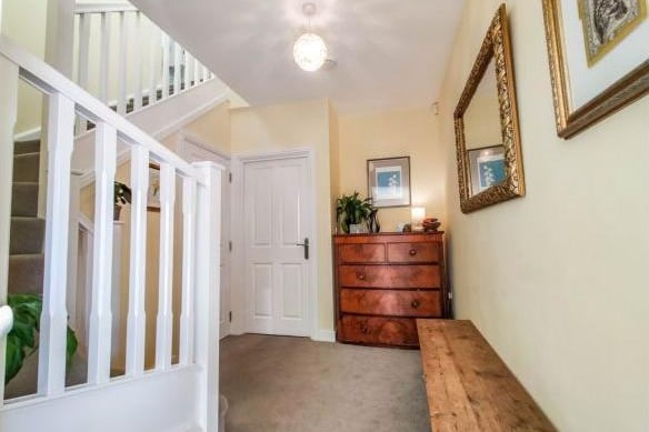 Enter into the bright and airy hallway area, which also provides access to a cloakroom.